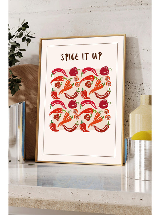 a framed poster with a repeating pattern of red peppers and oranges, accompanied by the text "SPICE IT UP" in bold letters.